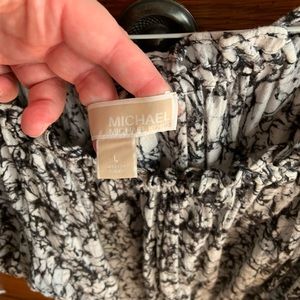 Micheal Kohrs size large blouse. Cheetah black and